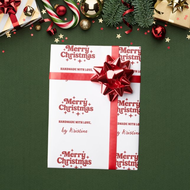 Röda vita handgjorda av julklapp omslutna presentpapper (Skapare uppladdad)