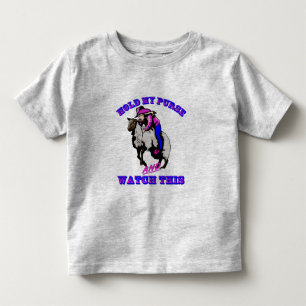 Rodeo Cowgirl Mutton Bustin’ Purse Watch this T-shirt