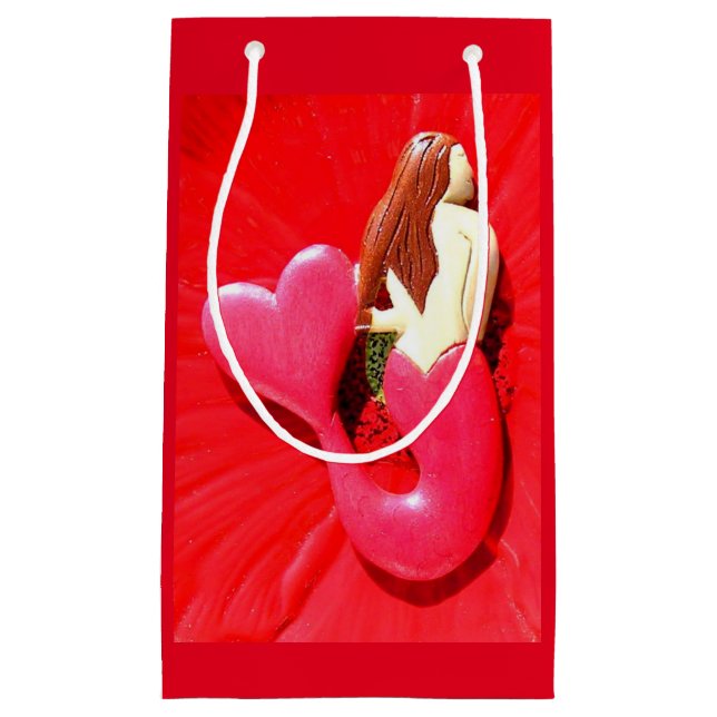 rödhjärtklappade sjöjungfruar (Framsidan)