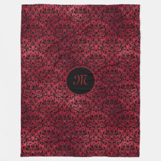 Rödsvart damm med Monogram Fleecefilt