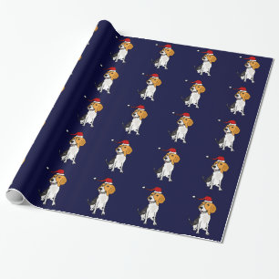 Rolig Beaglehund som ha på sig den Santa hatten Presentpapper