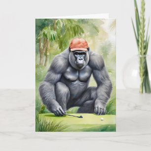 Rolig gorilla i röd basebollmössa som spelar golf kort