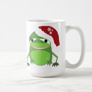 Rolig groda i tomteluva kaffemugg