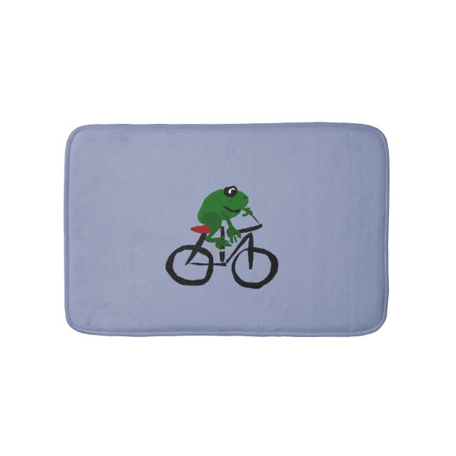 Rolig grön groda som rider en cykel badrumsmatta (Framsidan)