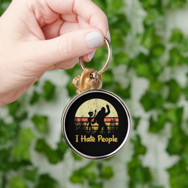 rolig jag hatar folk damtröjor rund silverfärgad nyckelring (Hand)