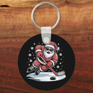 Rolig jul Santa spelar ishockey Xmas Nyckelring