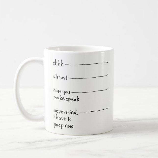 Rolig kaffemugggåva - du maj talar nu, poopen kaffemugg (Vänster)