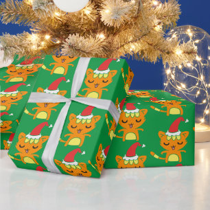 Rolig katt som bär tomteluva julkattsmönster presentpapper