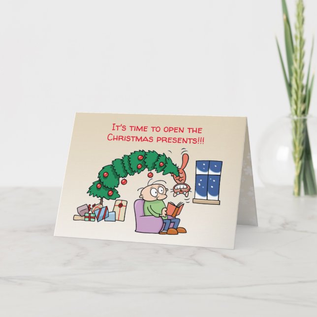 Rolig katt som hänger från julgranen, foto helgkort (Framsida)