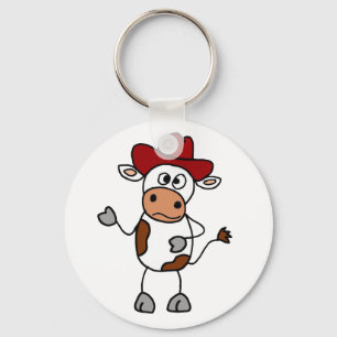 Rolig ko som ha på sig den röda Cowboyhatten Nyckelring