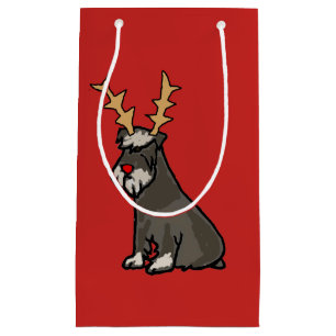 Rolig miniatyrSchnauzer med horn på kronhjortjul