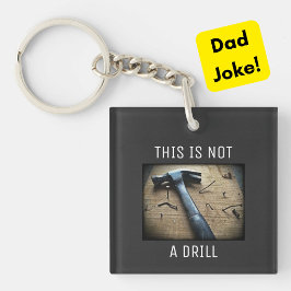 Rolig nyckelring med pappaskämt "Det här är inte e
