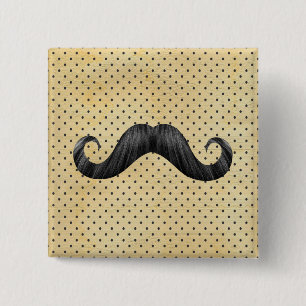 Rolig svart mustasch på vintagegultpolka dots knapp