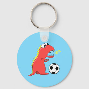 Rolig tecknadDinosaur som leker fotboll Nyckelring