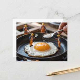 Roliga byggnadsarbetare som fixar ägg vykort