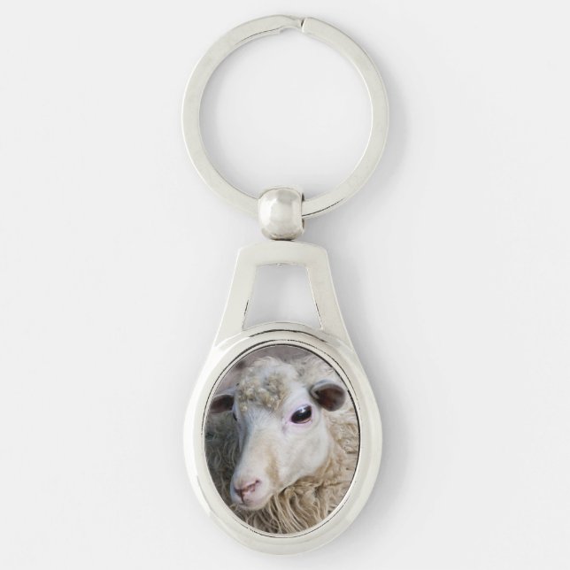 Roliga får ovalt silverfärgad nyckelring (Framsidan)
