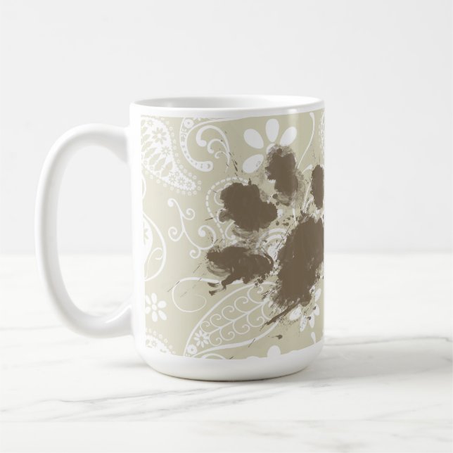 Roliga Pawprint på Ecru Paisley Kaffemugg (Vänster)