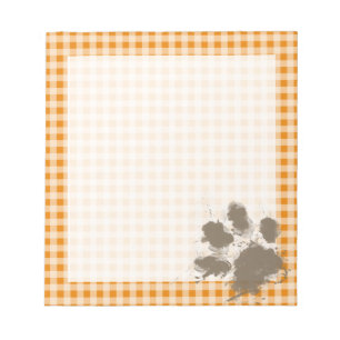 Roliga Pawprint på mörk - orange Gingham Anteckningsblock