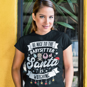 Roligt Var snäll mot barnvakten som tomten tittar T Shirt