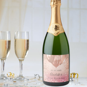 Roligten om rosa ros-ballonger i guld glitter vid 