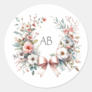 Romantisk blomsterbukett för baby shower med monog runt klistermärke