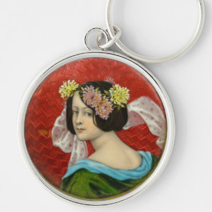 ROMANTISK KVINNA MED VINTAGE ENAMEL MED BLOMMAR RUND SILVERFÄRGAD NYCKELRING
