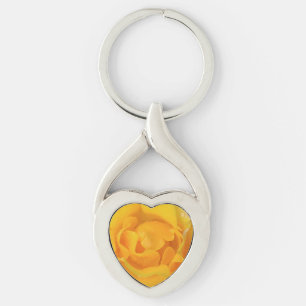 Romantiska gula rosenvattendroppar twisted heart silverfärgad nyckelring