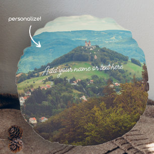 Romantiskt bergslandskap rund kudde