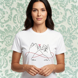 Romantiskt par som håller handarna, matchande till t shirt