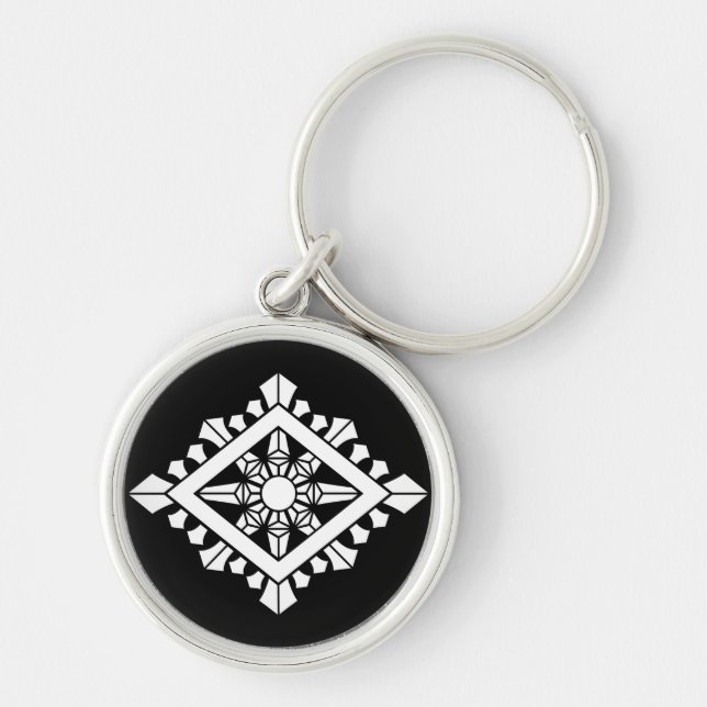 Rombisk dharma-chakra rund silverfärgad nyckelring (Framsidan)