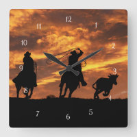 Roping Cowboys i Sunset