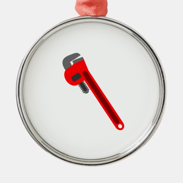 Rörmokaren rycker häftig julgransprydnad metall (Framsidan)