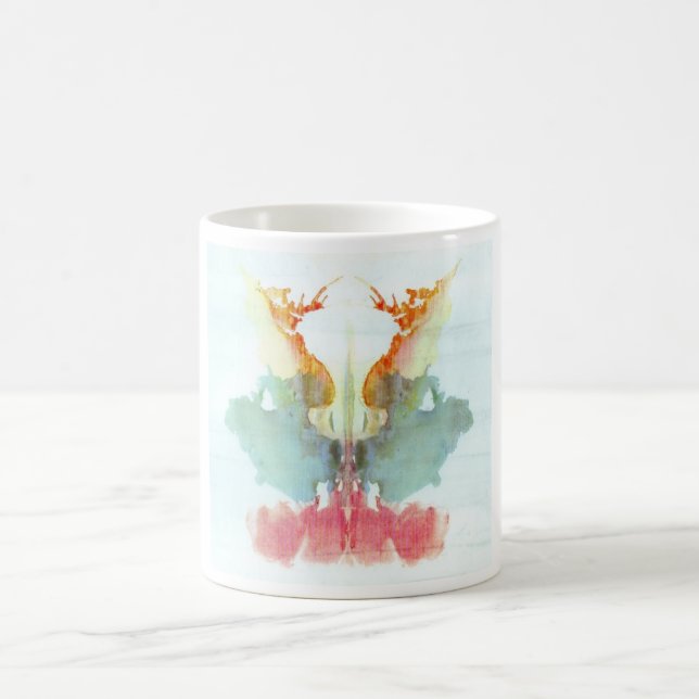 Rorschachen testar bläck som plumpar pläterar kaffemugg (Center)