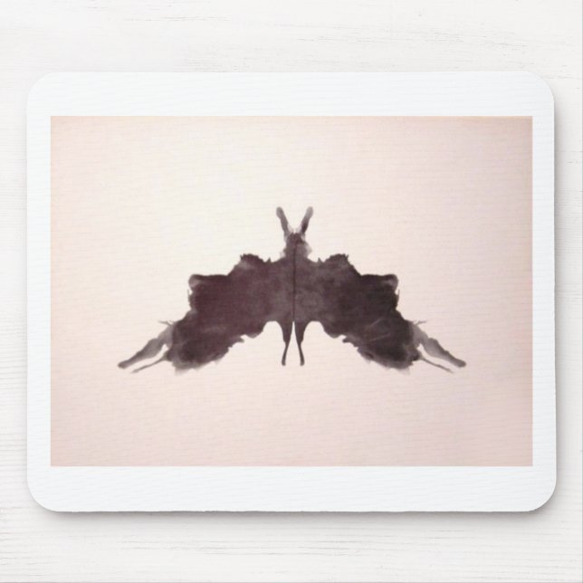 Rorschachen testar bläck som plumpar pläterar musmatta (Framsidan)