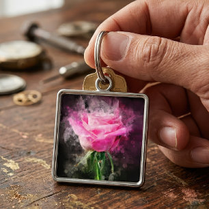 Rosa akvarell i rosa på svart bakgrund fyrkantig silverfärgad nyckelring