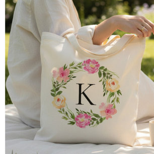 Rosa blommönster med monogram tygkasse