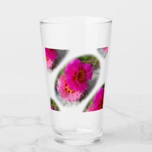 Rosa blommor i sol glaskopp