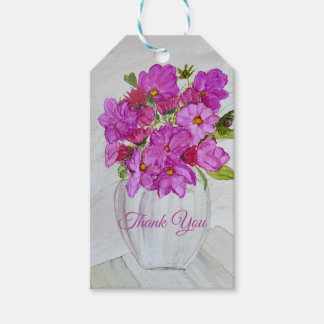 Rosa blommor i vas presentetikett