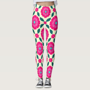 Rosa blommor med blåa centra och gröna blad leggings