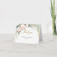 Rosa blommor och eukalyptus och guldram