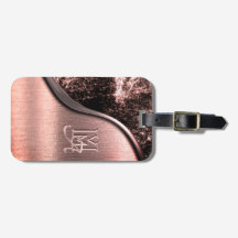 Rosa borstat metall och metallisk sten monogram