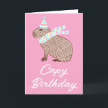Rosa Capy Birthday Funny Capybara Älskare Card Kort<br><div class="desc">Ett lustigt kort med en illustration av en kapybara med en pastellhatt och en sjal av rosa,  blått och gult,  med pun Capy Birthday nedan. Insidan lyder: "Önskar en speciell dag full med saken du kärlek. Grattis på födelsedagen!"</div>
