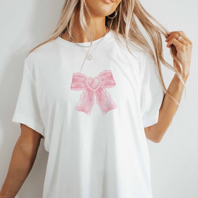 Rosa Coquette Bow T-Shirt (Pink bow on white oversized tee.)