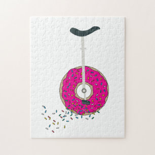 Rosa Donut Wheel Unicle med färgstarka sprinkler Pussel