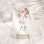 Rosa Dusty Ro Blommigt Bröllop Bordsnummer<br><div class="desc">Gå in i ett område av tidlös elegans och viskade löften med vår exquisite, där den ömtåliga skönheten hos dammiga petaler i ro sammanflätar med den mjuka alluran av pastellblomningar. Denna fängslande utformning förkroppsligar själva kärnan i romantik och sofistikeringen, med muterade botaniska ämnen som delikatmässigt placerats för att framkalla en...</div>