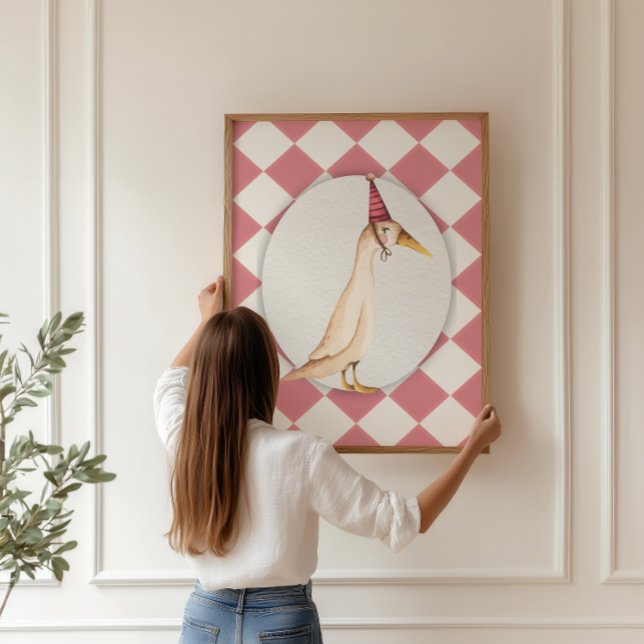 Rosa Fånig Goose Nursery Wall Art Print Poster (Coquette-inspired pink nursery with a framed silly goose art print on a beige harlequin background)