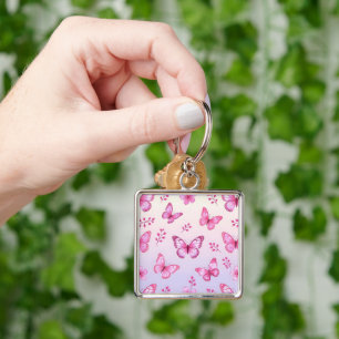 Rosa fjärilar och blommor mönster fyrkantig silverfärgad nyckelring