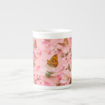Rosa fjärilsträdgård blomster benporslinsmugg