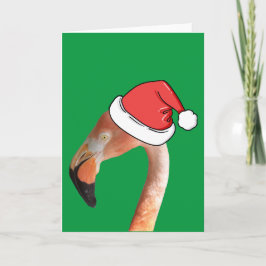 Rosa flamingo i röd kartongtomtehatt helgkort