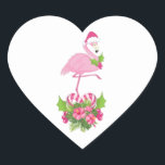 Rosa Flamingo i Santa Hat Whimsical jul Hjärtformat Klistermärke<br><div class="desc">Stickers med ett tropiskt tema julflamingo med en rosa julhatt. Under fötterna är en candy cane bouquet med tropiska blommor och rosa söt. En myrsprit på bröstet.</div>